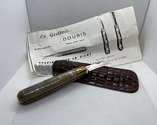 Coltello a serramanico da