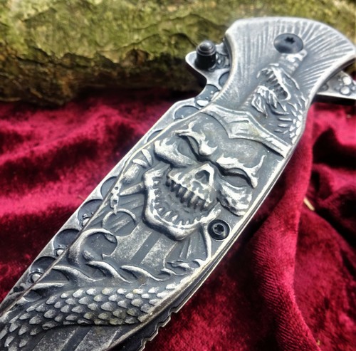 Coltello pieghevole - , a