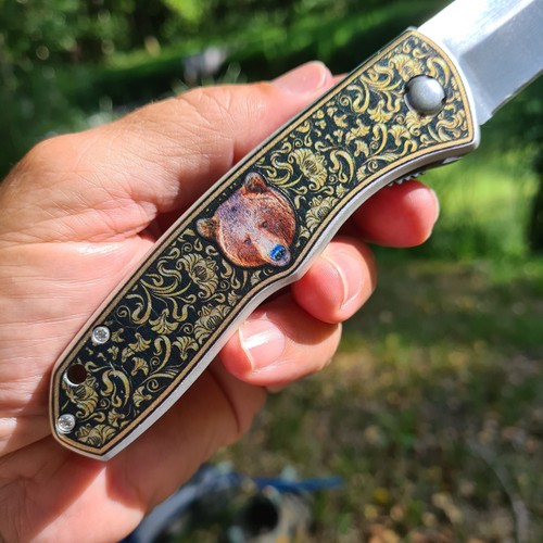 Coltello pieghevole - , a