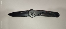 coltello a serramanico TRUE